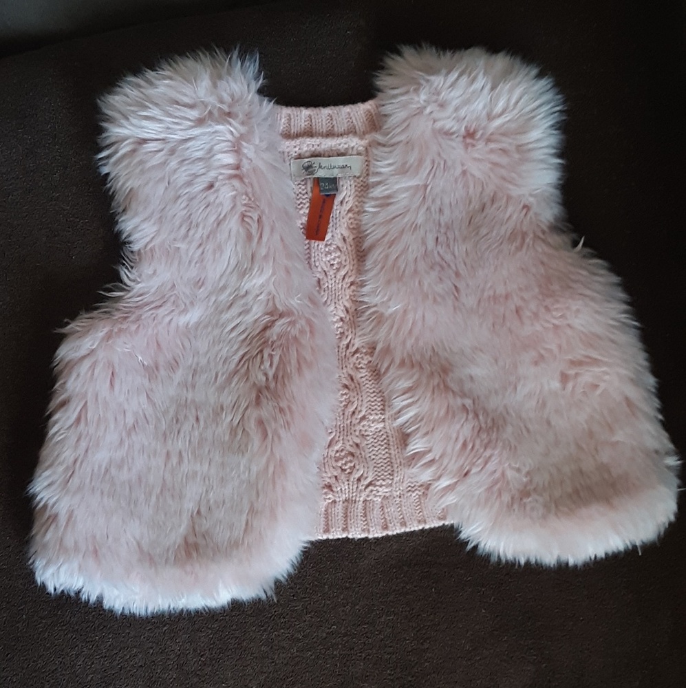 Childrens soft pink winter vest
